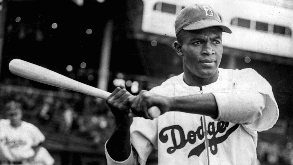 Jackie Robinson in Brooklyn Dodgers, swinging bat by American Photo