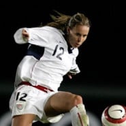 Leslie Osbourne kicking a soccer ball