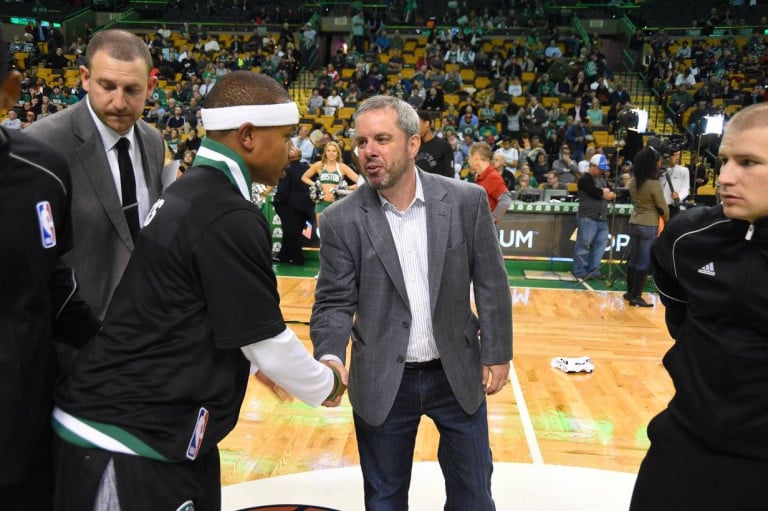 Rusty Sullivan shaking hands with Isaiah Thomas at center court of the TD Garden